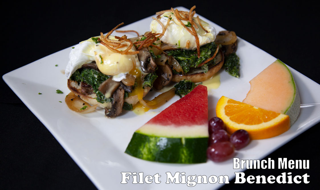Filet mignon eggs benedict with mushrooms and onions